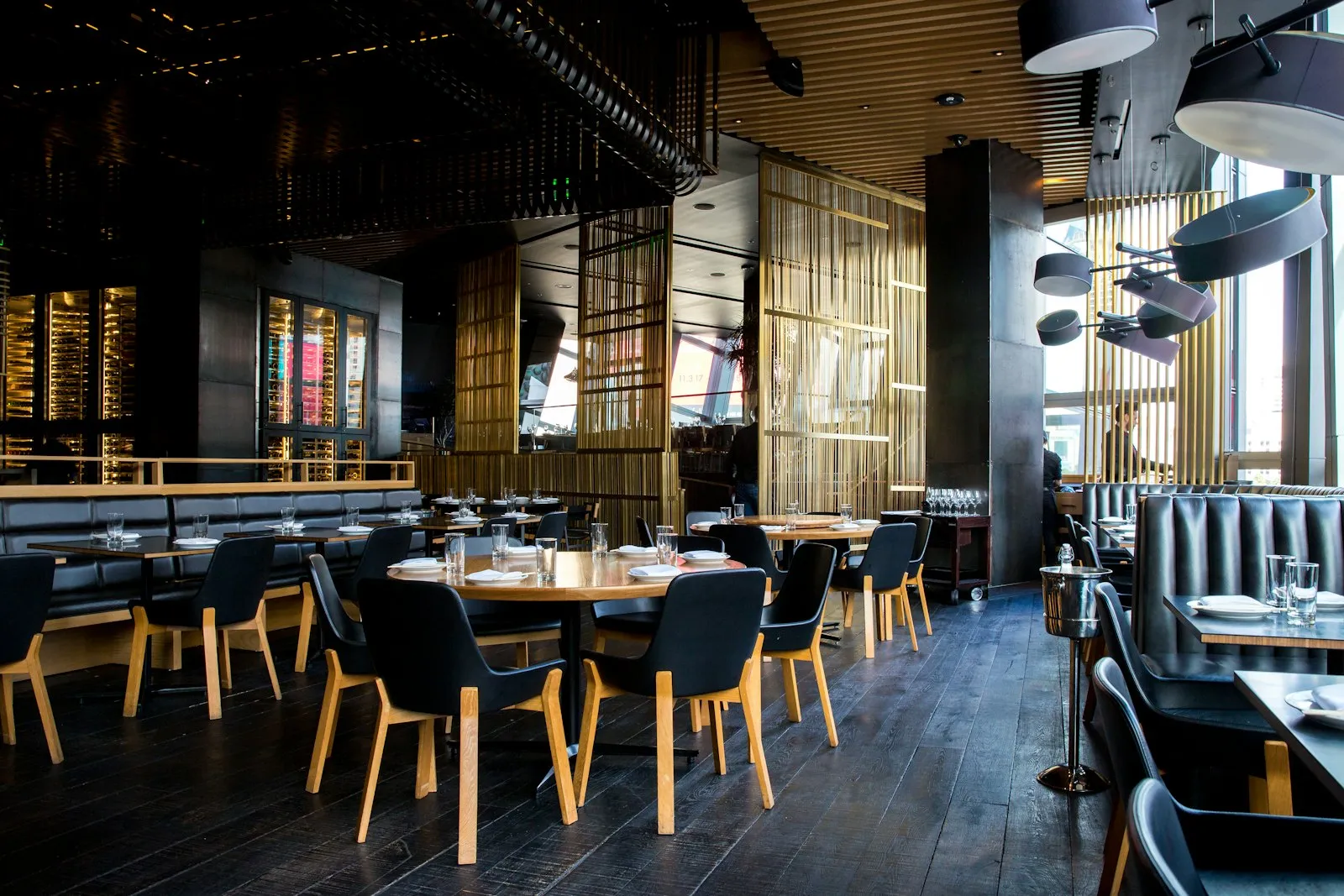 Warm wood-and-leather dining room at Bayou Bites