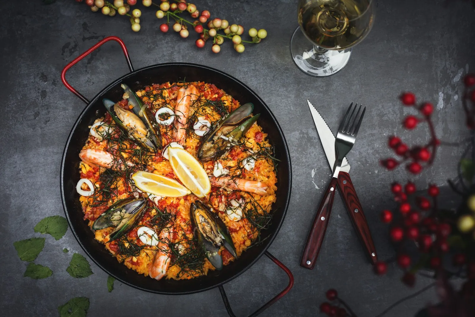 Smoky jambalaya loaded with shrimp and mussels in a cast-iron pan